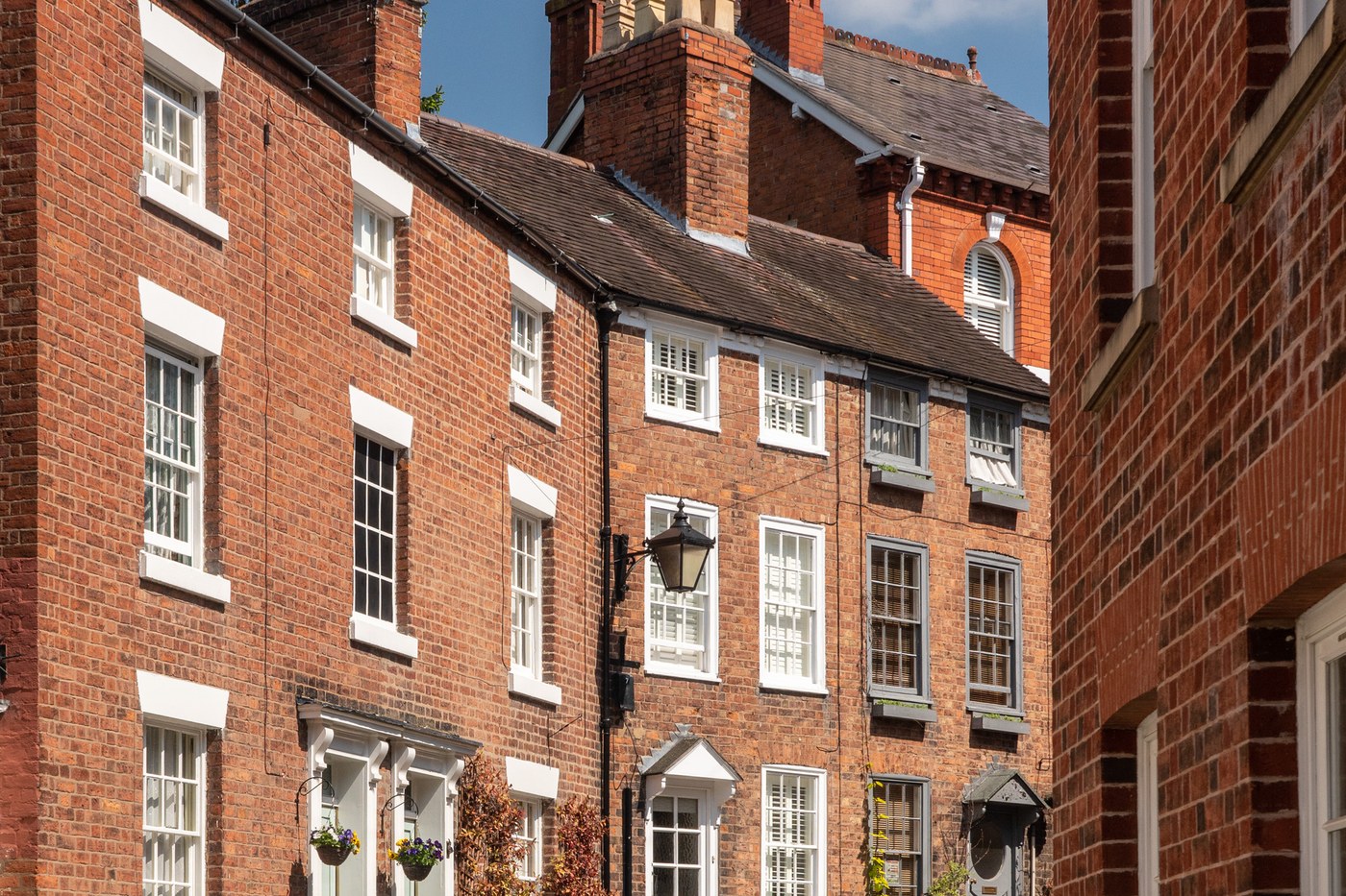 A tenanted residential street in England where rents stay open-market after rent controls were ruled out